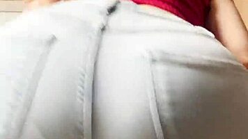 Petite Blonde Performs Seductive Striptease In Tight Jeans