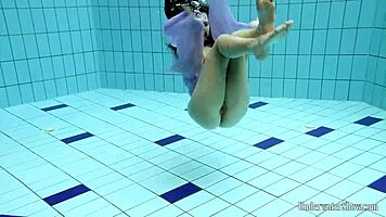 Blackhaired Aneta Relaxing In The Pool