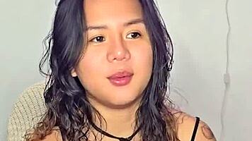 asian teen amateur gets excited by homemade music track