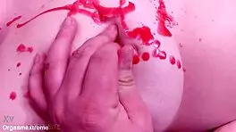 Pale redhead with big boobs endures wax play and nipple squeezing in BDSM.