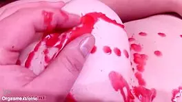 Pale redhead with big boobs endures wax play and nipple squeezing in BDSM.