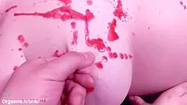 Pale redhead with big boobs endures wax play and nipple squeezing in BDSM.