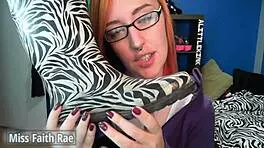 Lick my rainboots now, Miss Faith Rae's full video is wild with domination and dirty talk, don't miss this redhead in glasses!