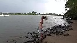 sexy blonde teen 18+ strips nude on public beach. she masturbates openly outdoors.