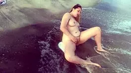 sexy blonde teen 18+ strips nude on public beach. she masturbates openly outdoors.