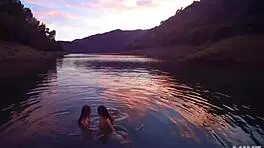 talia mint and mia rose get naked and fuck outdoors after swimming