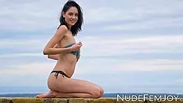 skinny sade mare teases with spread legs outdoors