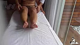 Young latina girl gets a tantric massage on the therapist's table