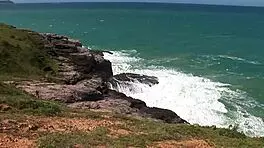 on the rock facing the sea we do a bit of hard cuddles