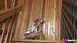 Sexy Ana Fey gets bored while sweeping wood stairs.