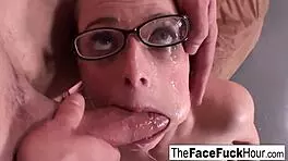 Teen in glasses eagerly slobbers on his throbbing cock