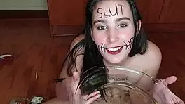 Self-degrading slut eats piss-covered fruits with body writing 😈