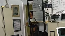 The dirty girl eagerly sucks her manager's massive black cock right in the office.