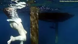 young sluts feel liberated swimming naked alone