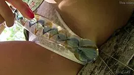 Lucy G strips naked in the park, enjoying her shaved pussy outdoors with a sexy model vibe.