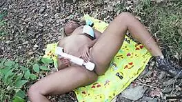 Nina Rivera enjoys playing with toys in the woods