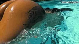 With her clothes set aside, Yorgelis seduces the producer by the pool underwater.