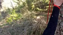 laura bound in hood and heels