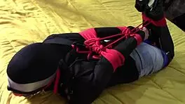 laura bound in hood and heels