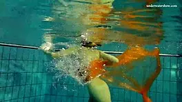 Nastya strips clothes and shows body in pool