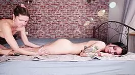 Lesbian oil massage leads to orgasm