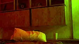 Linda Houston dances seductively under the full red light, captivating everyone with her moves