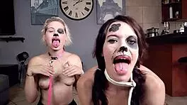 Two puppy slaves drool with tongues out for fetish play