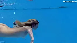 casual-narrative cute blonde mimi cica swimming underwater in pool