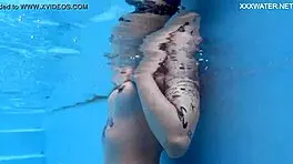 casual-narrative cute blonde mimi cica swimming underwater in pool