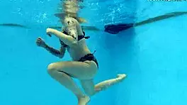 casual-narrative cute blonde mimi cica swimming underwater in pool