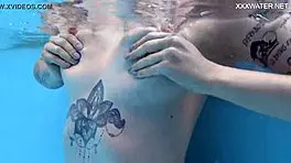 casual-narrative cute blonde mimi cica swimming underwater in pool