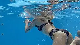 casual-narrative cute blonde mimi cica swimming underwater in pool