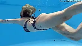 casual-narrative cute blonde mimi cica swimming underwater in pool