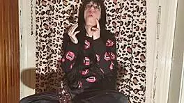 Goth Girl Smokes Cigarette Backstage After Long Day In HD