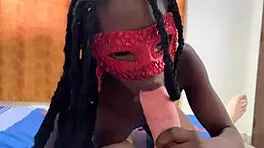 ebony teen performs solo act in suggestive manner