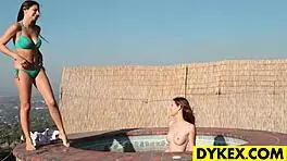 Two women explore outdoor lesbian activities with strapons and dildos.