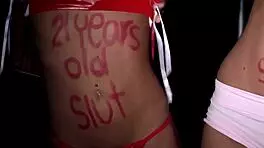 Young Binca, just 18, kneels bound in tight ropes. She sucks obediently under strict command.