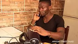 On an African street, a handyman technician bangs his client hard. Unprecedented action unfolds during a TV repair.