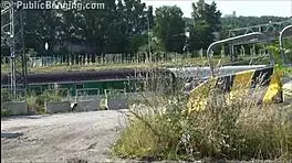 very cute blonde girl gets public sex with two guys on the street, blowjob and vaginal fucking while people watch