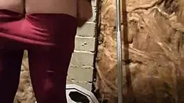 Gym Girl Teases with Sultry Striptease Moves