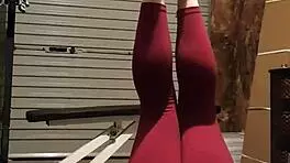 Gym Girl Teases with Sultry Striptease Moves