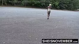 Ebony girl MsNovember squatting pissing public in skirt upskirt heels.