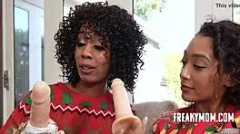 Christmas gets wild with ebony mom and teen sis.