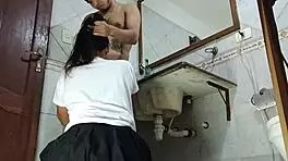 Student And Partner Engage In Bathroom Encounter