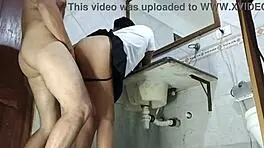 Student And Partner Engage In Bathroom Encounter