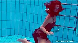 Yo, check this out, shaved cutie Nata Szilva looks like a mermaid in her bikini at the beach. She's stunning in the shower too!