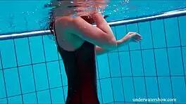 Yo, check this out, shaved cutie Nata Szilva looks like a mermaid in her bikini at the beach. She's stunning in the shower too!