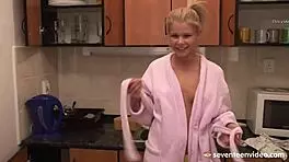 Cutie Fondles Shaved Pussy With Toy In Kitchen