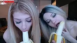 Two Brunette Babes Suck Bananas On Webcam