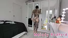 Just chilling with Melody Radford trying on sexy g-strings and micro bikinis